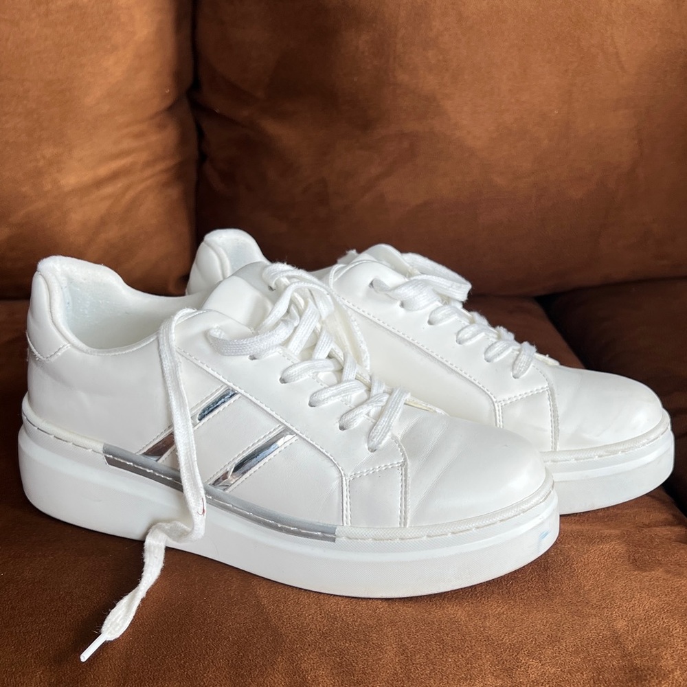 Stylish White Sneakers with Silver Accents